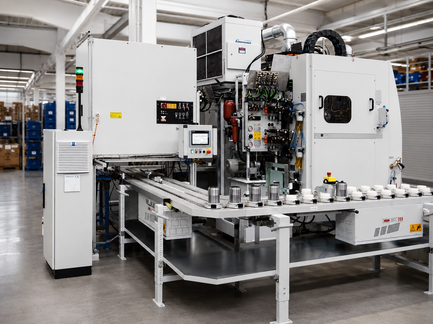 Sondermaschine mit Lasertechnik und Werkstückträger-Transfer
